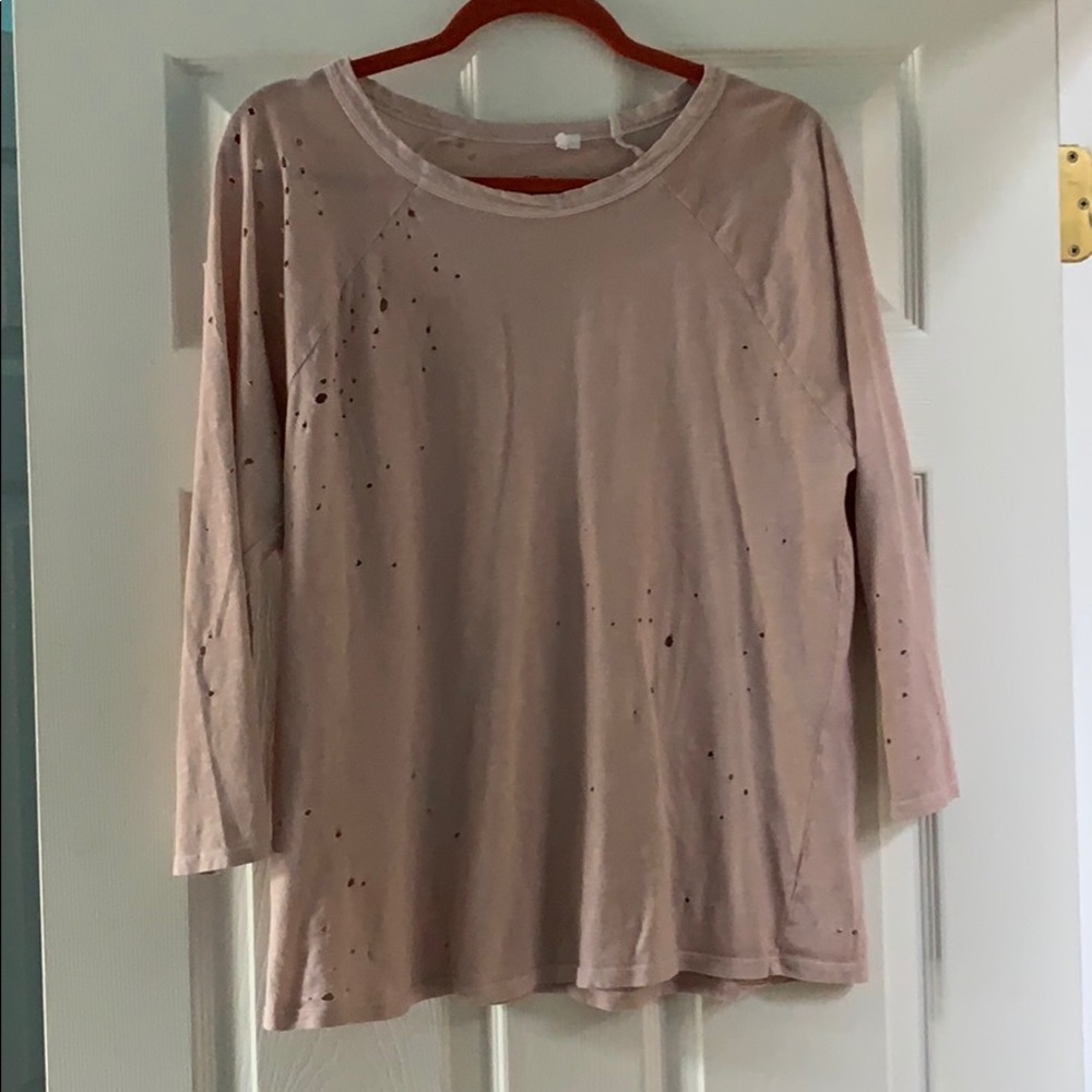 salmon quarter sleeve shirt with small holes